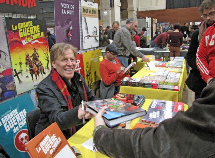 Patt Mills sur le stand de Delirium Patt Mills sur le stand de Delirium